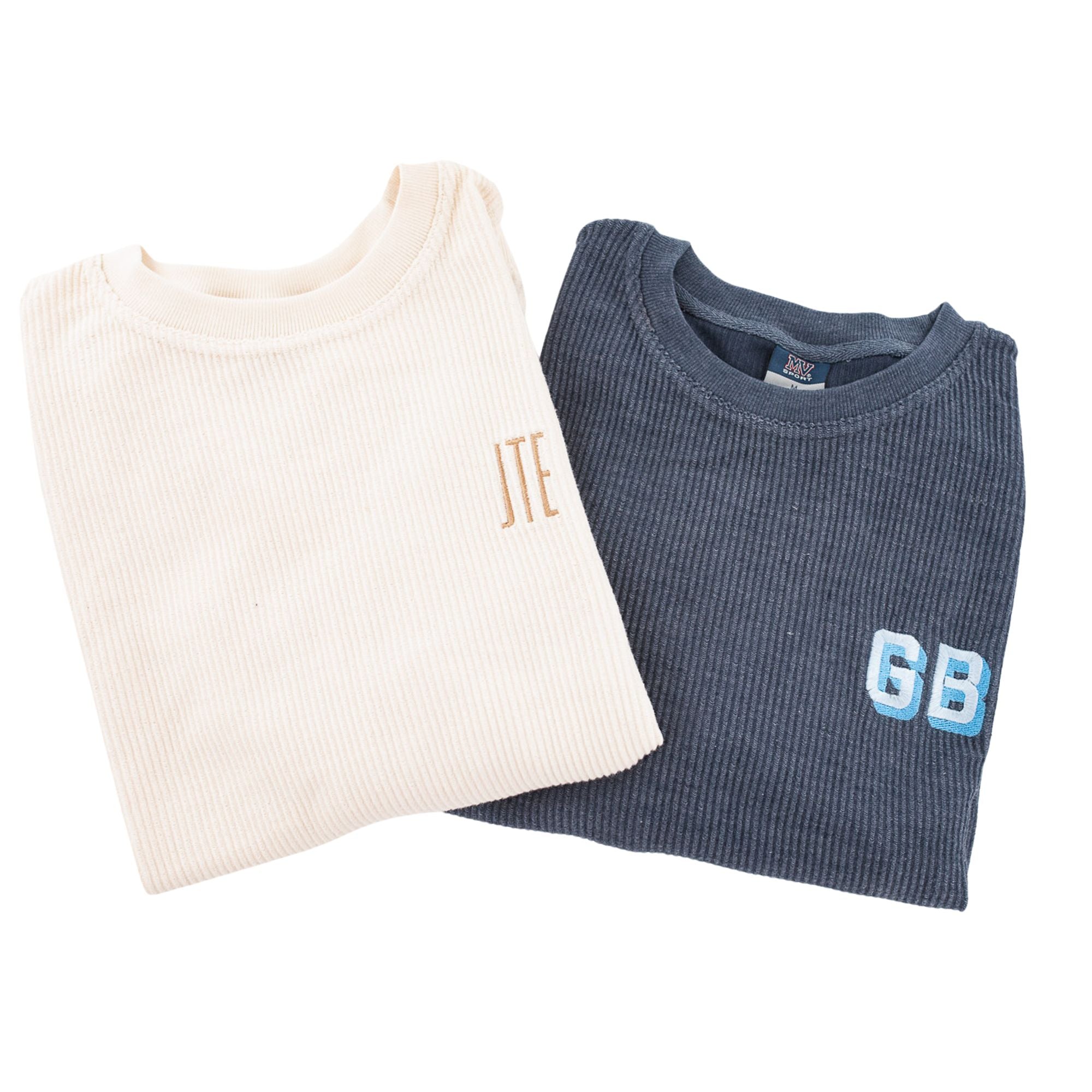 Two corded sweatshirts one in navy and one in cream have monograms on the left chest
