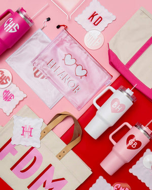 A variety of pink and red products is set out for a Valentine's collection