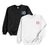 A pair of sweatshirts one black and one white have monograms on the left chest