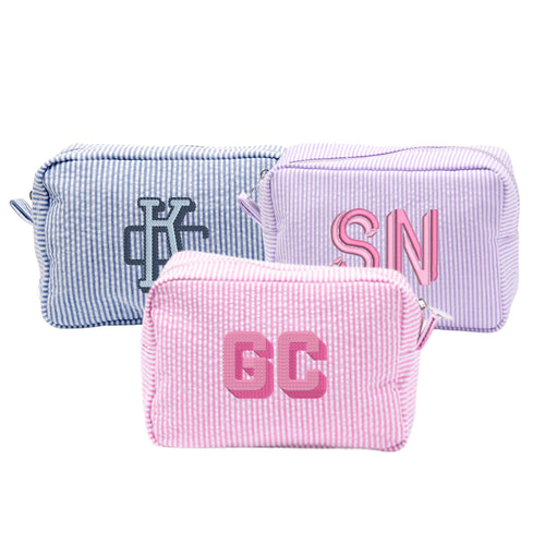 Embroidered seersucker pouch featuring a personalized monogram in contrasting thread color