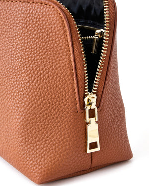 A tan leather pouch is opened to show the hardware on the bag.