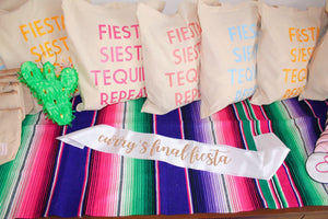An assortment of products are set up for a final fiesta theme bachelorette party.