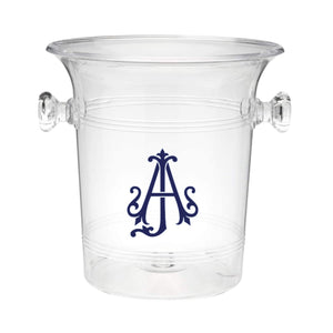 A clear ice bucket with "AJ" monogrammed on the front in an interlocking format