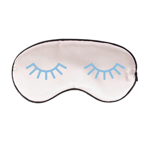 A white sleep mask that has been customized with a light blue eyelash design.