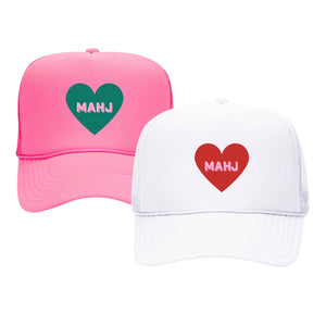 Two Mahjong trucker hats with hearts one is pink and one is white