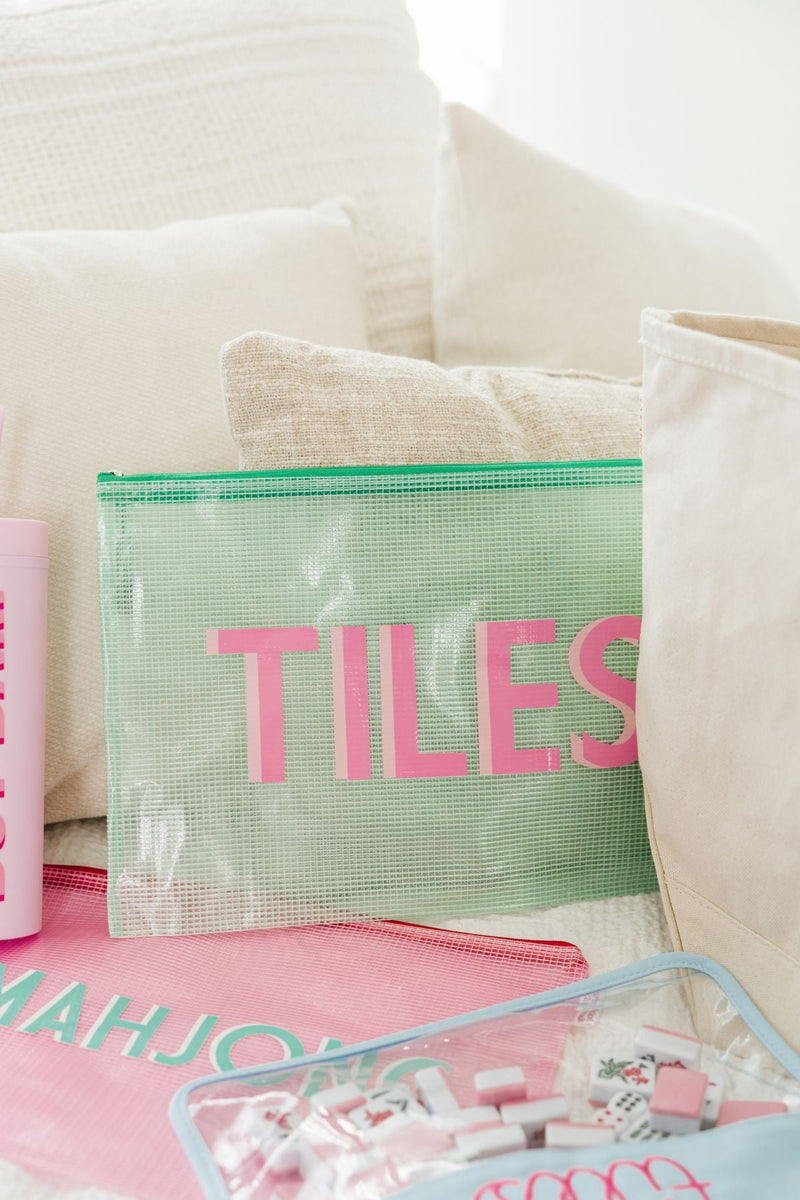 A green Mahjong pool bag that reads "Tiles"