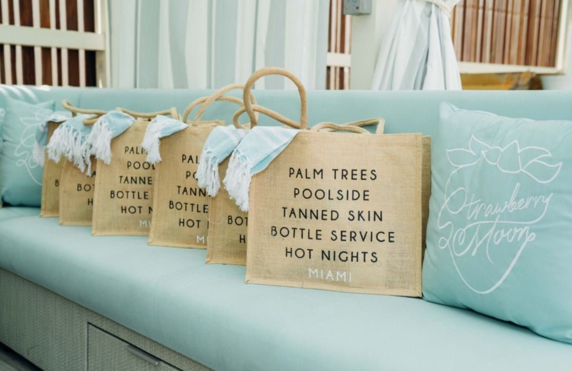 A jute carryall tote customized with sayings about Miami