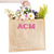 A custom jute bag has "ACM" monogrammed on the front in pink