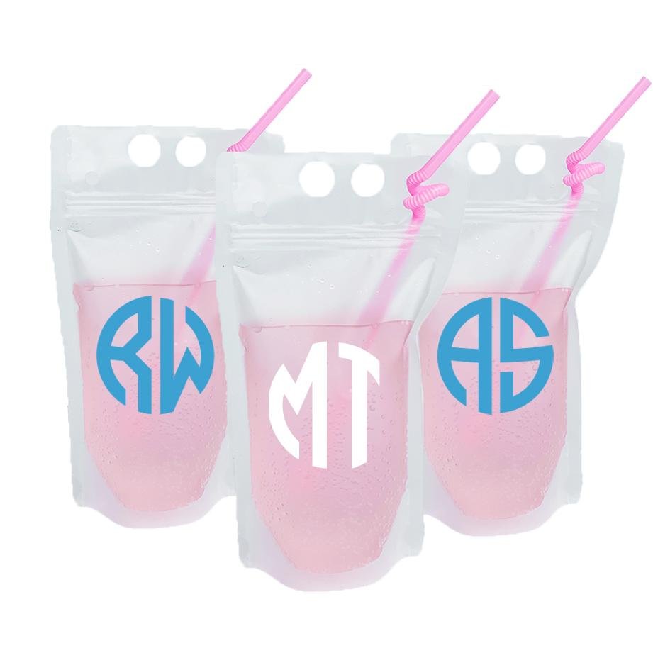 An assortment of party pouches with a circle monogram in blue and white.