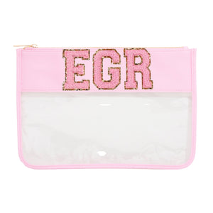 A pink clear nylon bag is customized with pink patches