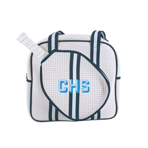 A navy and white pickleball bag is customized with a blue monogram.