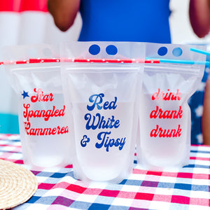 Fun patriotic party pouches sit on a plaid red, white, and blue table cloth