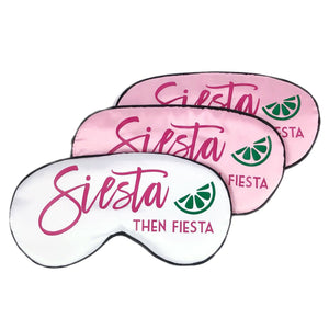 Pink and white sleep masks are customized with a pink design that says "Siesta then Fiesta".
