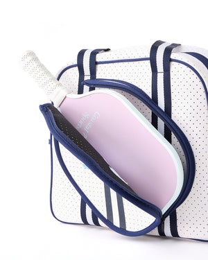 A  navy pickleball bag is unzipped to show the area where paddles can be stored.