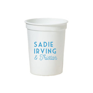 A white stadium cup is customized with a 3 name design in blue