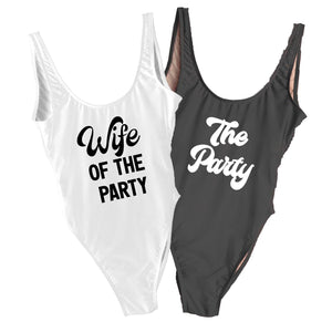 Two swimsuits one black and one white read "Wife of the Party" and "The Party"